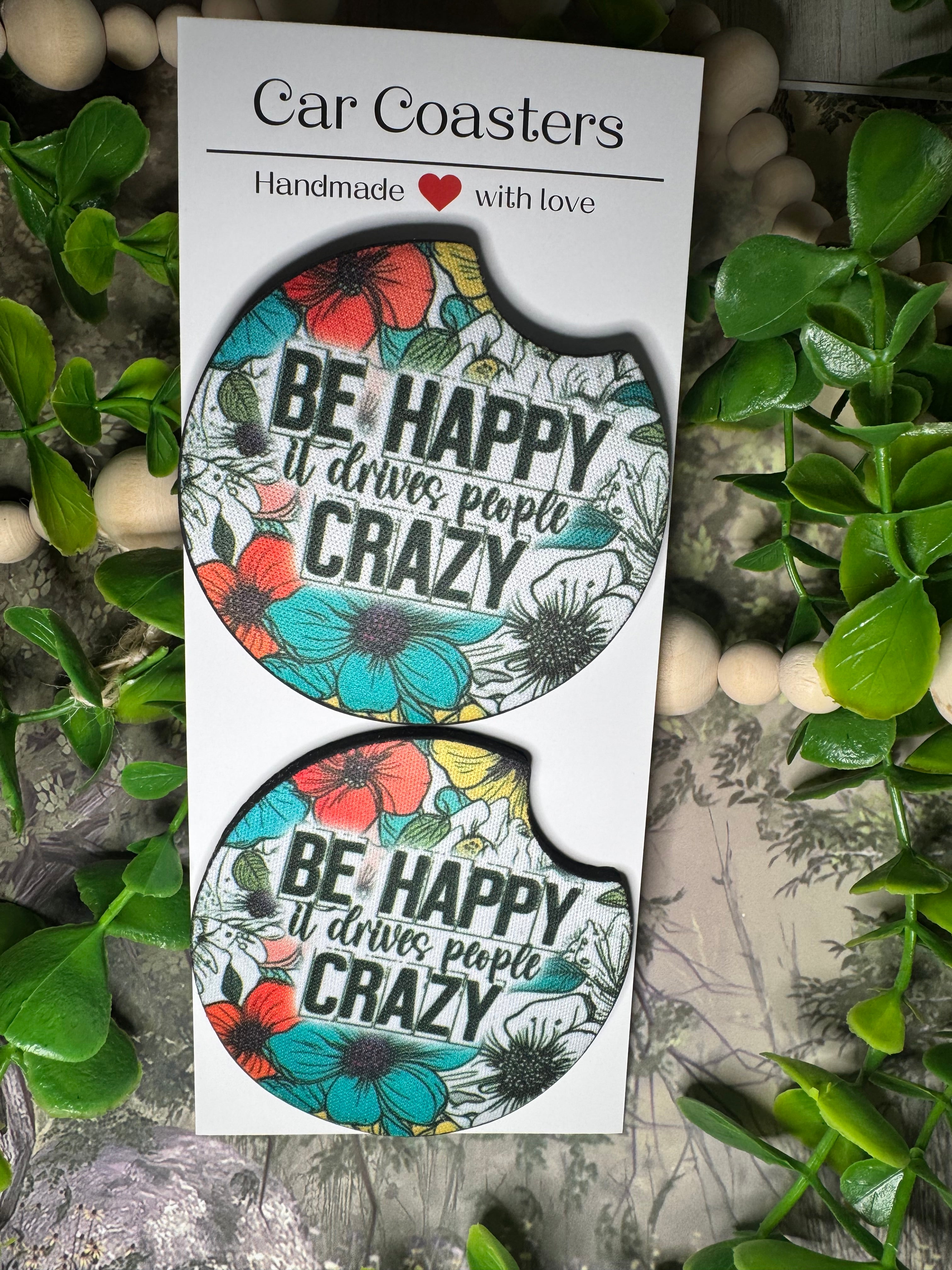 “Be Happy — It Drives People Crazy” Floral Car Coasters (Set of 2)