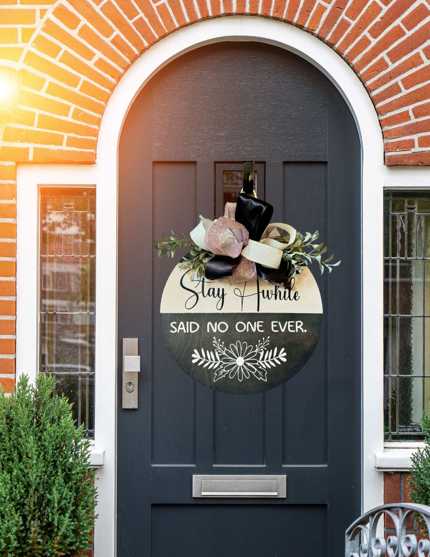 Stay Awhile Said No One Ever Round Door Hanger – Farmhouse Front Door Decor with Bow & Greenery